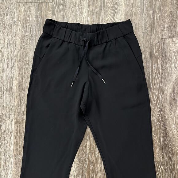 EUC Lululemon On the Fly 7/8 Pant Stretch High-Rise Black Sz 6 Minimalist Jogger - Picture 4 of 16